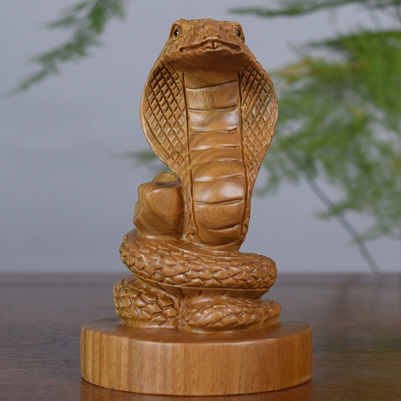 靈蛇獻(xiàn)瑞 案頭綠檀，生肖祥瑞中的吉祥靈性